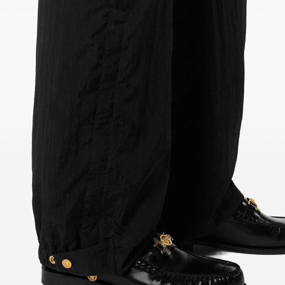 
                  
                    Pantaloni Versace 10215491A15795 1B000 Versace 
                  
                