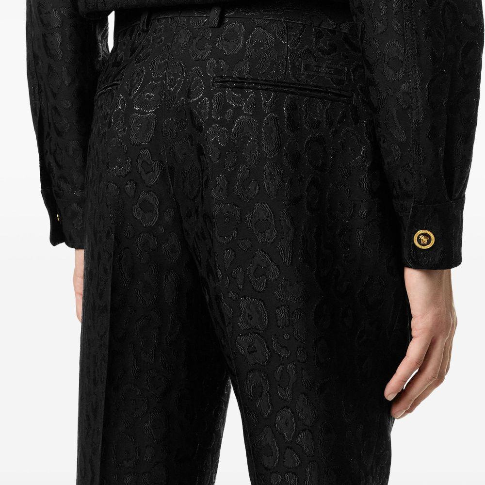 
                  
                    Pantaloni jacquard Leopard Versace<BR/> 10166481A15785 1B000 Versace 
                  
                