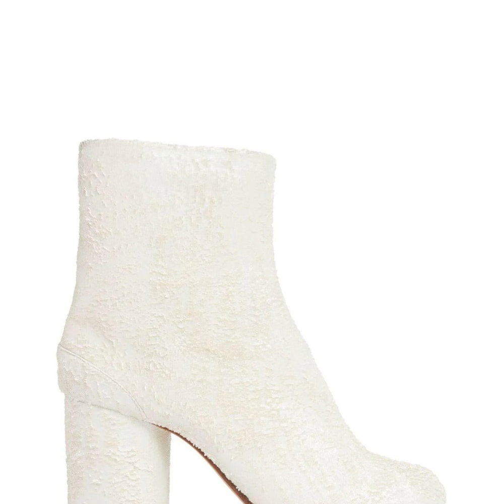 
                  
                    Maison Margiela S58WU0260P8159HA740
                  
                